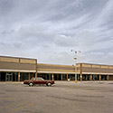 Changing Chicago Project: Roll 12 Neg 14 Car and Closed Strip Mall, Chicago Heights IL 09.23.87 - Photograph by Jay Boersma