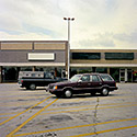 Changing Chicago Project: Roll 12 Neg 18 Cars by Empty Strip Mall, Chicago Heights IL 09.23.87 - Photograph by Jay Boersma