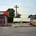 Changing Chicago Project: Roll 14 Neg 15 Closed Gas Station, South Holland IL 10.06.87 - Photograph by Jay Boersma