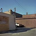 Changing Chicago Project: Roll 27 Neg 08 Boarded Building and Car, Chicago Heights 09.11.87 - Photograph by Jay Boersma