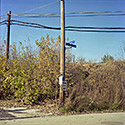 Changing Chicago Project: Roll 61 Neg 05 Post and Railroad Tracks, Blue Island IL 10.30.87 - Photograph by Jay Boersma
